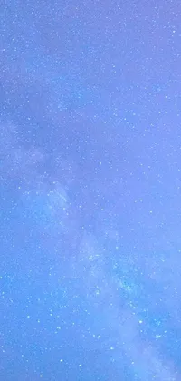 This live wallpaper for your phone presents an epic scene of a plane soaring through a deep blue sky, with a cosmic background full of shining stars