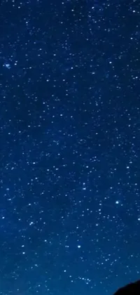 Transform your smartphone into a stunning night sky scene with this live wallpaper