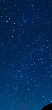 Get mesmerized by this Phone Live Wallpaper showcasing a cinematic shot of a stunning night sky