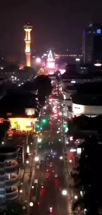 This live wallpaper showcases a vibrant city street filled with bustling traffic that creates a stunning and dynamic display against a black nighttime backdrop