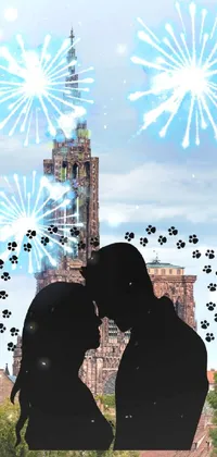 This live wallpaper features a beautiful silhouette of a couple in a romantic kiss amidst a display of colorful fireworks