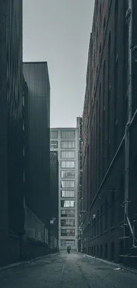 This live wallpaper depicts a black and white photo of city streets, with a low angle dimetric composition and a grey warehouse background
