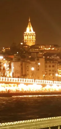 This stunning live wallpaper set at night showcases the urban beauty of Istanbul from the perspective of a bridge