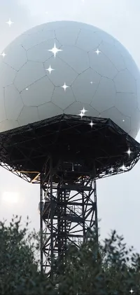This stunning phone live wallpaper features a white ball on a tower set against a blue sky