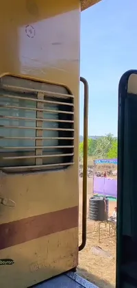 This phone live wallpaper showcases a front view of an open train door, offering an Instagram-worthy view of the landscape outside