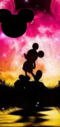 This stunning live wallpaper is inspired by the Disney universe, featuring everyone's favorite mouse - Mickey! Enjoy the magical vibes of this Mickey Mouse-themed wallpaper, with a giant pink moon and beautiful redpink sunset in the background