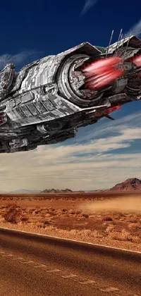 This live wallpaper for your phone features a detailed composition of a spaceship soaring above a desert road, with a mysterious skeleton below