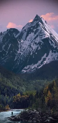 This phone live wallpaper showcases a breathtaking river and mountain landscape