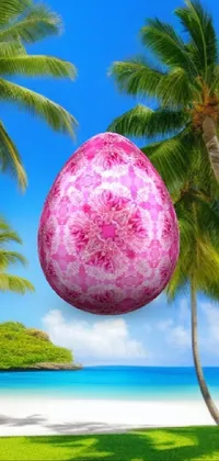 Looking for a vibrant and refreshing live wallpaper for your phone? Look no further than this tropical-inspired design! Featuring a glossy pink egg perched atop lush green grass and a scenic tropical beach backdrop, this wallpaper is a feast for the eyes