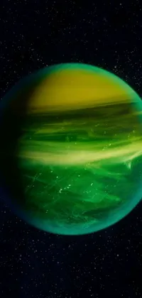 This phone live wallpaper displays a green and yellow planet floating amidst a backdrop of sparkling stars against a black void