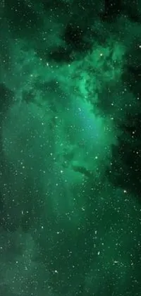 This live wallpaper features a green sky filled with stars, a microscopic photo, space art, nebulas, and shooting stars