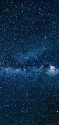 Transform your phone's display with our stunning live wallpaper featuring the Milky Way galaxy