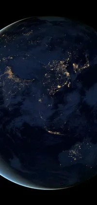 This dynamic phone live wallpaper features a stunning view of planet Earth at night as seen from space