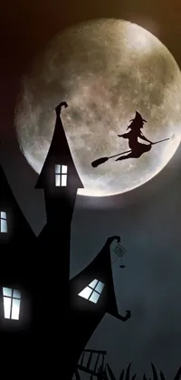 This live wallpaper showcases a witch in flight against a full moon with a haunted house theme