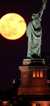 This live wallpaper features the Statue of Liberty with a prominent full moon in the background, providing a stunning and peaceful ambiance for your phone