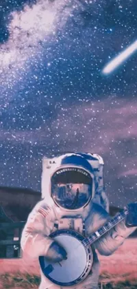 This live phone wallpaper showcases a man in an astronaut suit strumming away on a banjo with an interstellar theme