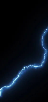 Experience the power of nature with this lightning bolt live wallpaper! Against a deep black background, the finely detailed bolt crackles with electricity in bright, thin wires
