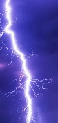 This phone live wallpaper showcases a stunning image of a lightning bolt placed against a captivating purple sky