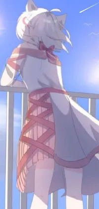 This phone live wallpaper features a stunning anime drawing of a woman standing on a balcony next to a fence