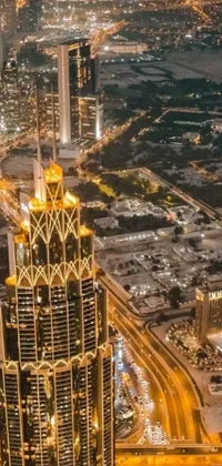 Get captivated by the stunning aerial view of an Arabian metropolis at night with this phone live wallpaper