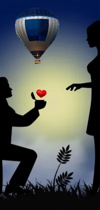 This phone live wallpaper showcases a romantic proposal in front of a colorful hot air balloon