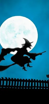 This phone live wallpaper showcases a captivating digital art image of a witch flying on her broomstick against a large full moon