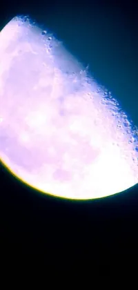 This phone live wallpaper features a close-up photograph of a frisbee against the backdrop of the moon