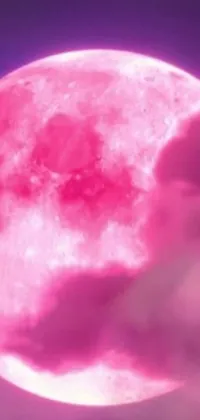 This live wallpaper features a stunning pink full moon against a background of clouds, transforming through a teaser trailer footage into a powerful final form