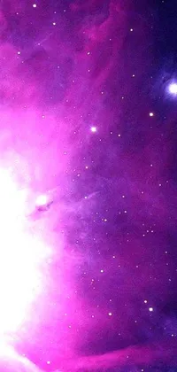 This live phone wallpaper features a stunning purple nebula and stars in a space art design