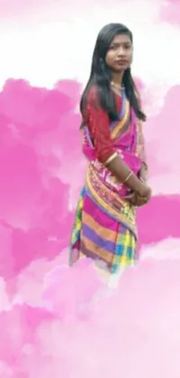 This live wallpaper for your phone features a woman wearing a vibrant, colorful sari standing on clouds in a Tumblr-style aesthetic