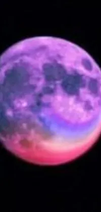 This stunning live wallpaper features a full moon set in a vividly hued night sky with purple, pink, and blue neons creating a multiverse effect