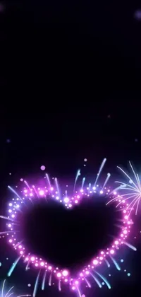 Looking for a spectacular live wallpaper that will give a beautiful visual experience on your phone? Look no further! Our phone live wallpaper depicts an amazing display of fireworks in the shape of a heart on a sleek black background