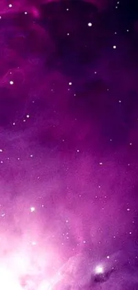 If you're a fan of the cosmos and love a stunning phone wallpaper, look no further than this purple star-filled sky