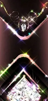 This breathtaking phone live wallpaper showcases a stunning diamond in intricate, ebony art deco style, set against a pink background