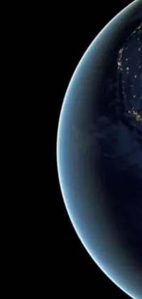 This phone live wallpaper offers an awe-inspiring view of the planet Earth during the night from outer space