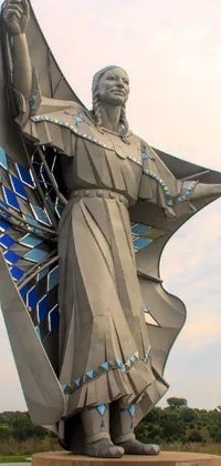 This live wallpaper depicts a stunning statue of a man with wings on a pedestal