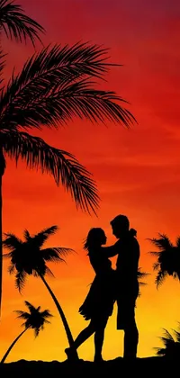Enjoy a beautiful live wallpaper for your phone featuring a romantic couple sharing a kiss under a palm tree at sunset