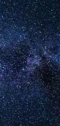 Looking for a mesmerizing live wallpaper for your mobile device? Look no further than this stunning night sky wallpaper