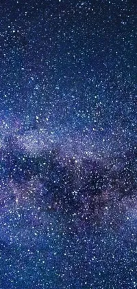 Looking for a mesmerizing live wallpaper for your phone? Look no further than this stunning night sky design! With a deep indigo background and twinkling stars that mimic the real thing, this wallpaper transforms your phone into a cosmic wonderland