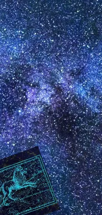 Looking for a captivating live wallpaper for your phone? Check out this stunning depiction of a book sitting on a wooden table under a mesmerizing star-filled sky