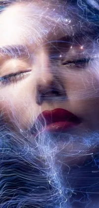 This phone live wallpaper displays a women with closed eyes attracting blue lightnings in a fantasy digital artwork