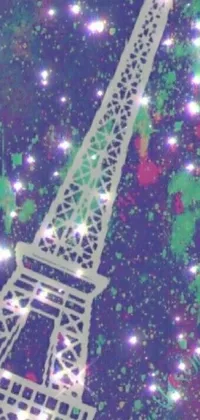 This live wallpaper for phones showcases a stunning pointillism rendition of the Eiffel Tower from a unique angle