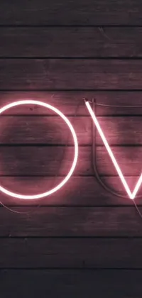 The Love Neon Live Wallpaper features a neon sign with the word "love" against a wooden wall