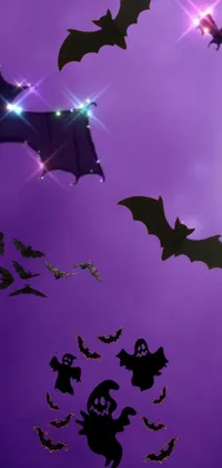 This phone live wallpaper depicts a group of bats in flight against a digital art design by a noted artist