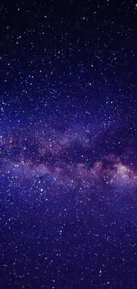 Upgrade your phone screen with this stunning live wallpaper featuring a night sky filled with stars
