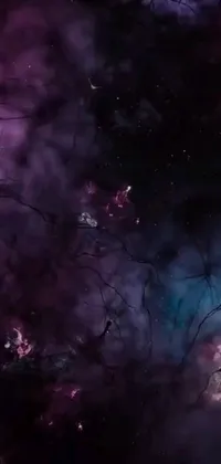 This live wallpaper features a floating cell phone against a dark, dramatic sky background with powerful nebula and a cosmic tree of life