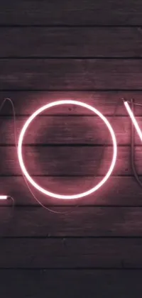 Experience romance and nostalgia with this incredible phone live wallpaper! Featuring an animated static image of a handmade wooden wall with a brightly lit neon sign that spells "love," this piece is sure to inspire a pink-hued mood of love and beauty that lasts