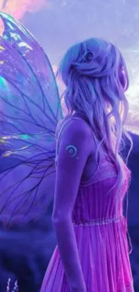 This phone live wallpaper features an enchanting depiction of a fairy-like woman standing in front of a vibrant full moon