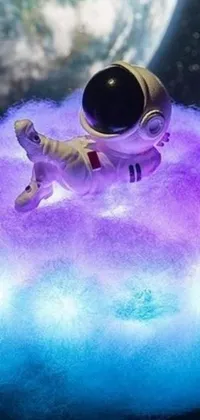 This dreamy phone live wallpaper features an astronaut floating on a fluffy cloud with a full moon in the background