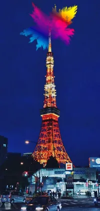 This stunning live wallpaper showcases a beautifully lit Eiffel Tower at night